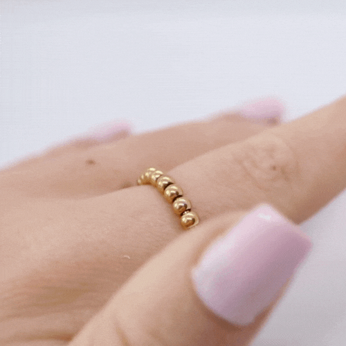 Anxiety Ring goud kleurig (RVS) in beweging