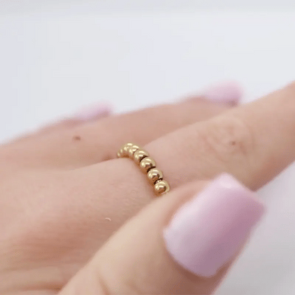 Anxiety Ring goud kleurig (RVS) in beweging